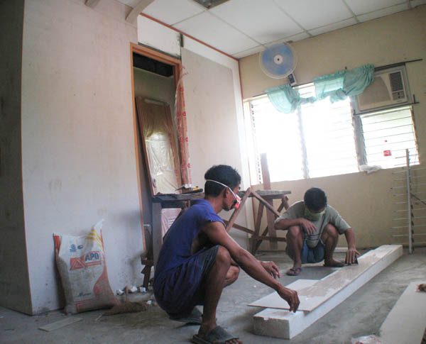 Dao Room Conversion Deaf workers construct restroom and shower.