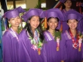 4-female-grads-with-grins
